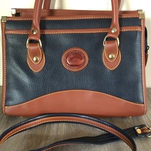 Dooney and Bourke navy blue leather handbag.